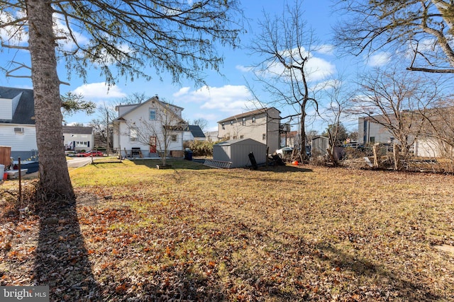 view of yard with a storage shed