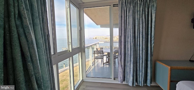 entryway featuring a water view