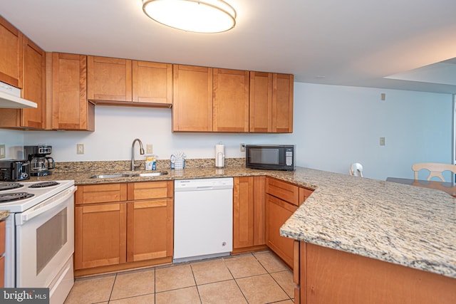 kitchen with kitchen peninsula, light tile patterned flooring, white appliances, and sink