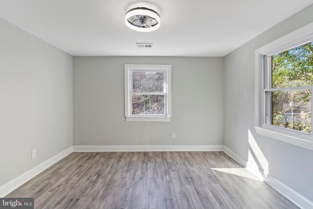 empty room with light wood-type flooring