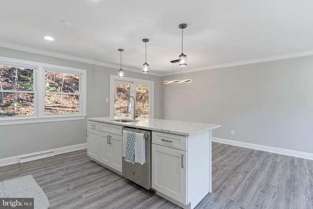 kitchen with dishwasher, white cabinets, sink, hanging light fixtures, and light wood-type flooring