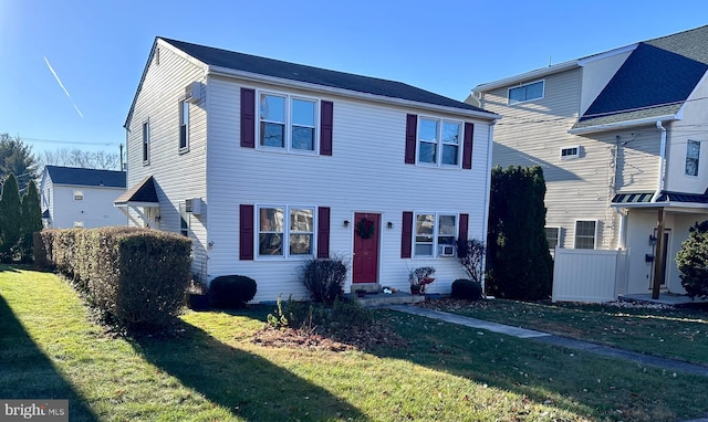 view of front of home with a front yard