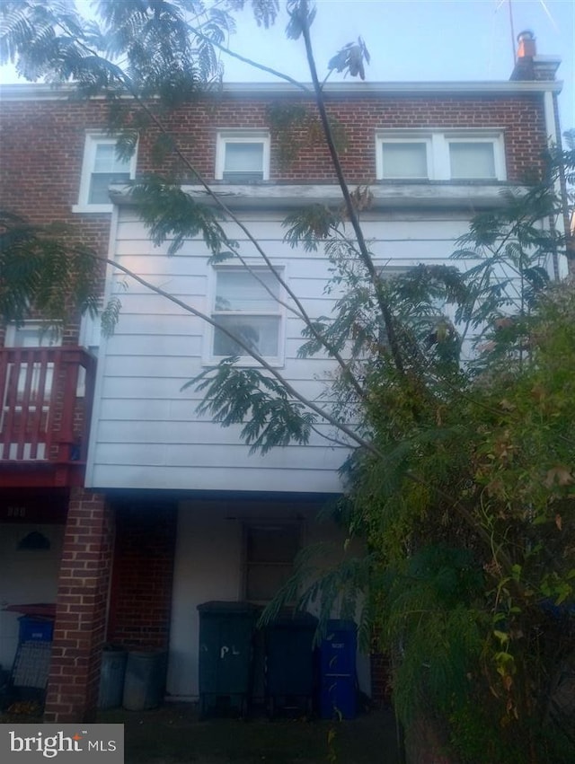 515 Quintana Pl NW, Washington, DC 20011 - view of home's exterior with brick siding and a balcony