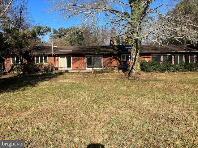 exterior space featuring a lawn