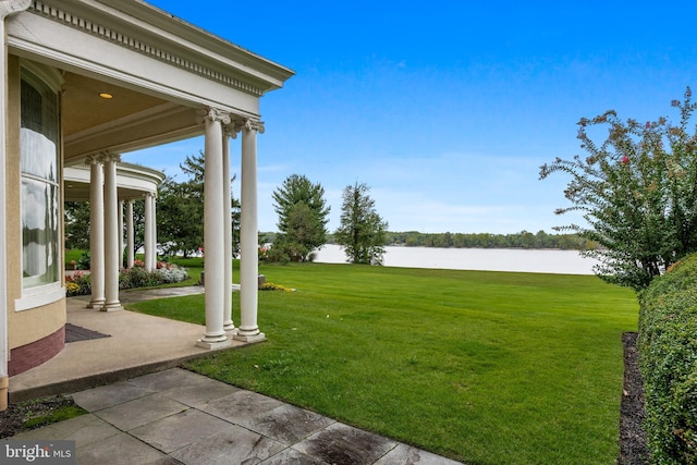 view of yard with a water view