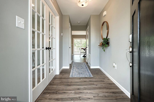 interior space featuring dark hardwood / wood-style flooring and french doors