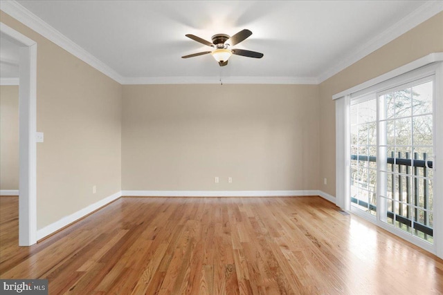 spare room featuring ceiling fan, crown molding, and light hardwood / wood-style floors