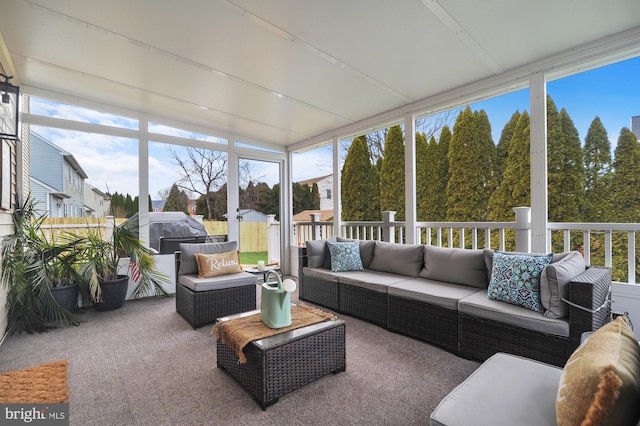 sunroom / solarium with a wealth of natural light