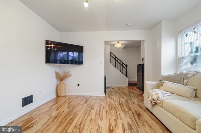 living room featuring light hardwood / wood-style flooring