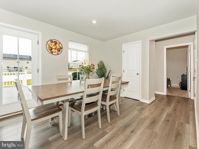 dining room with light wood-type flooring