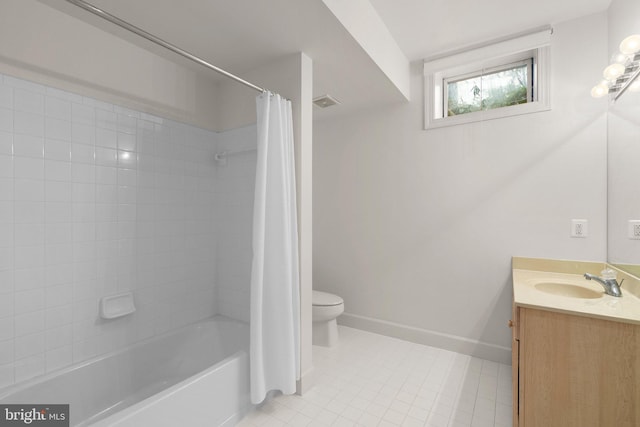 full bathroom with tile patterned flooring, toilet, vanity, baseboards, and shower / bath combo