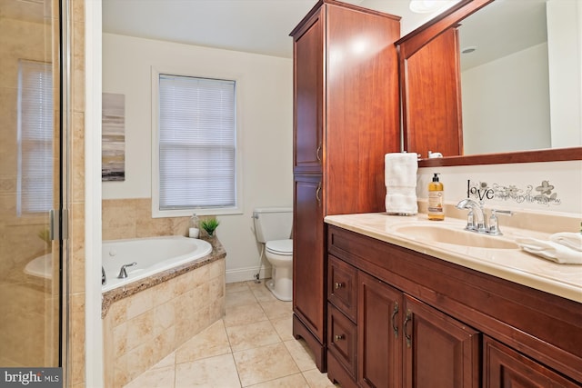 full bathroom featuring tile patterned floors, vanity, independent shower and bath, and toilet