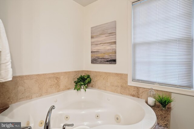 bathroom featuring a tub