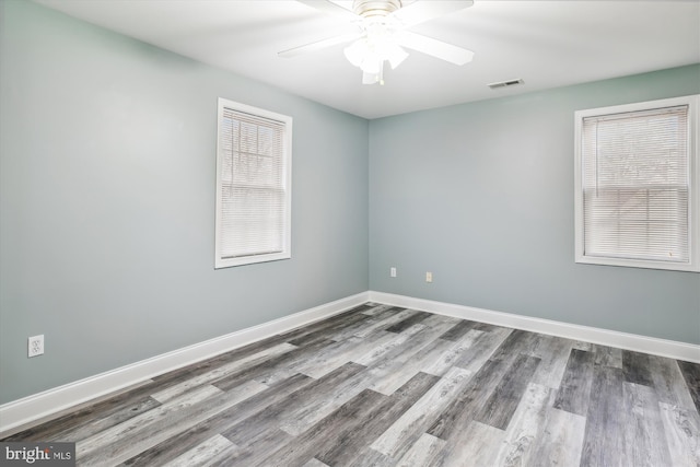 unfurnished room featuring ceiling fan and hardwood / wood-style flooring