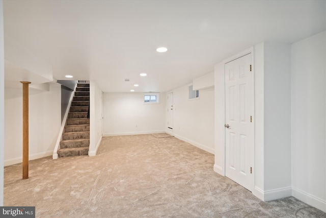 basement with light carpet