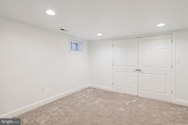 basement with carpet floors