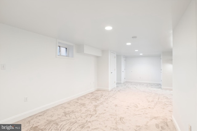 basement with light carpet