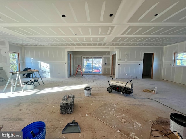 unfurnished living room with a wealth of natural light