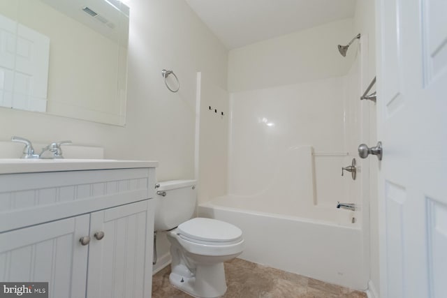 full bathroom featuring toilet, shower / washtub combination, and vanity