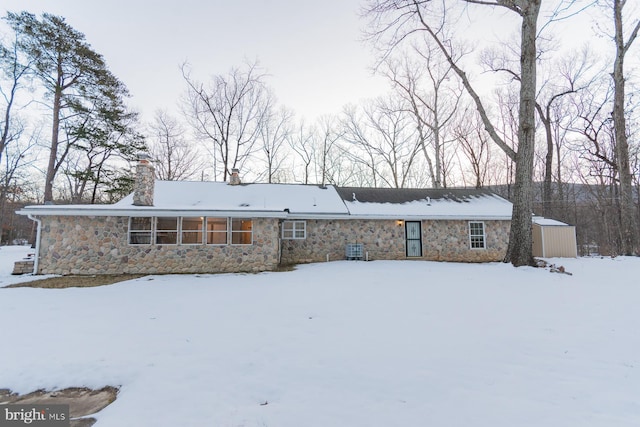 view of snow covered property