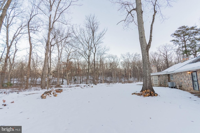 snowy yard with cooling unit