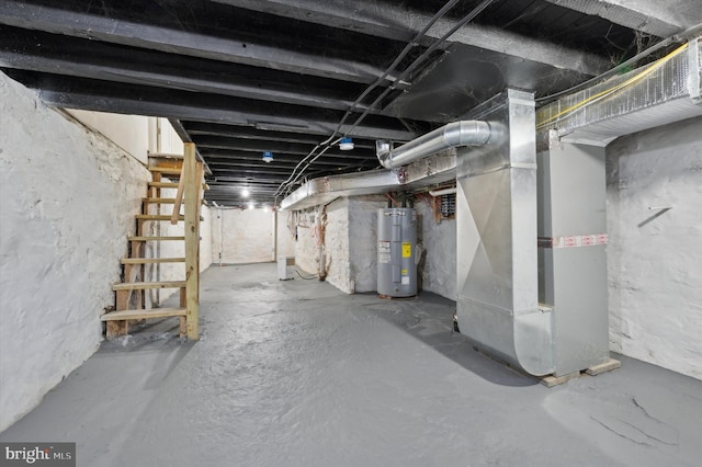 basement featuring heating unit and electric water heater