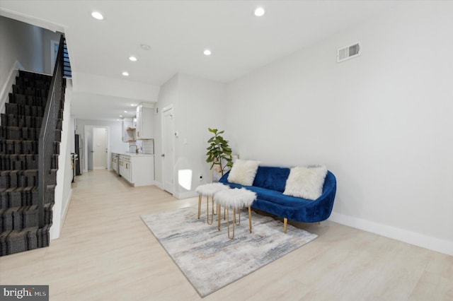 living area with light wood-type flooring