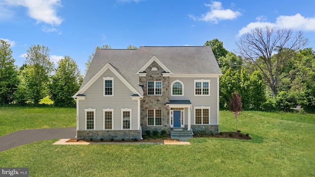 view of front facade with a front yard