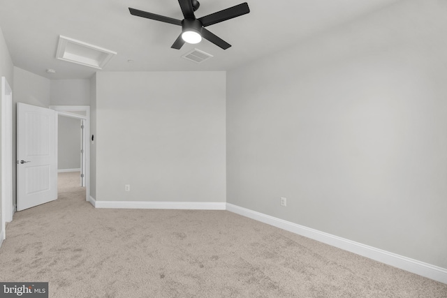 unfurnished room with light carpet