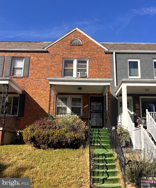 view of property with a front lawn