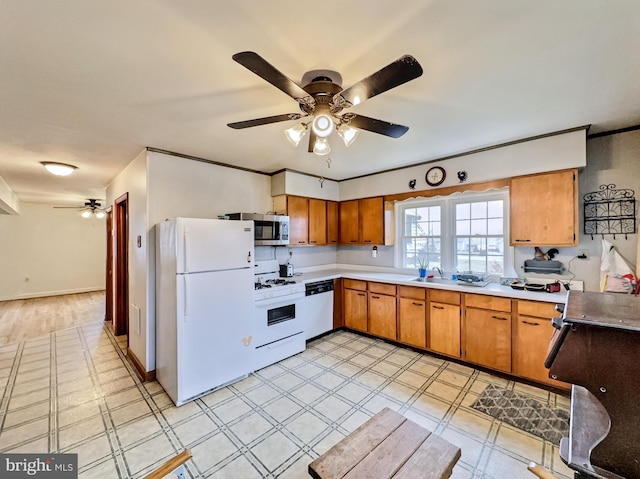 kitchen featuring white appliances, light hardwood / wood-style flooring, and ceiling fan