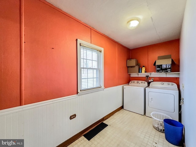 laundry area with washer and clothes dryer