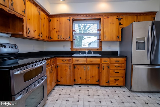 kitchen featuring sink and stainless steel appliances