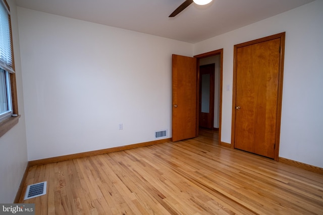 unfurnished bedroom featuring light hardwood / wood-style floors and ceiling fan