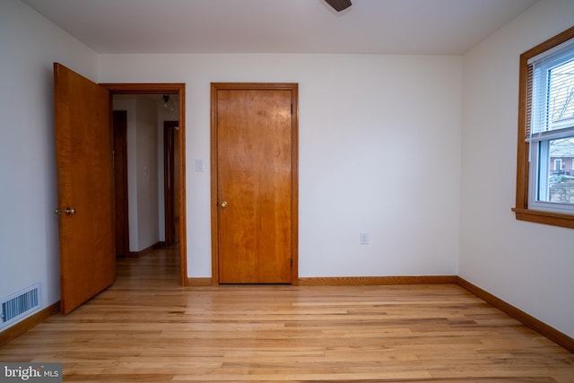 empty room with light wood-type flooring