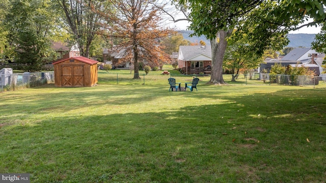 view of yard with a storage shed