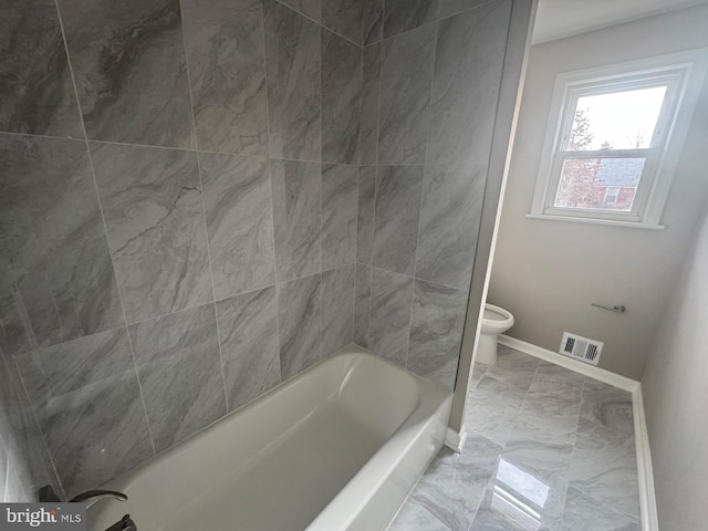 2215 Iverson St, Temple Hills, MD 20748 - bathroom with marble finish floors and bathtub / shower combination
