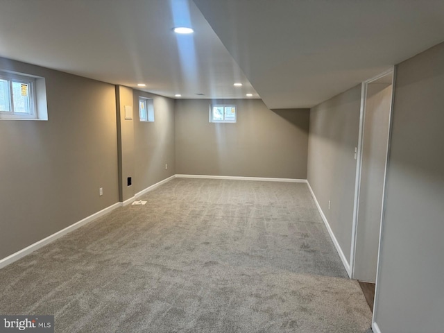 basement with carpet flooring