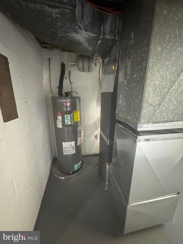 2215 Iverson St, Temple Hills, MD 20748 - utility room with electric water heater and heating unit