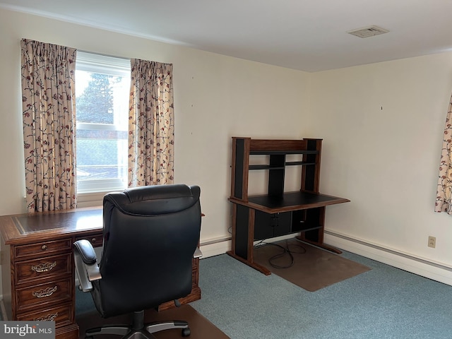 home office with carpet and a baseboard radiator