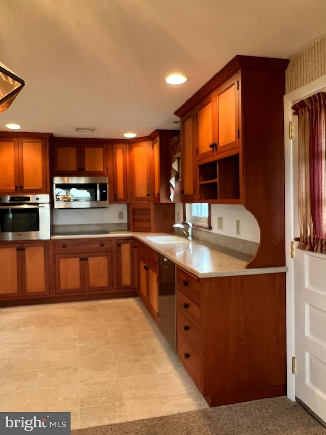 kitchen featuring appliances with stainless steel finishes and sink