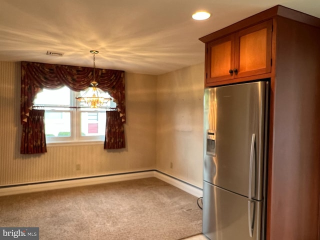 kitchen featuring pendant lighting, light carpet, a baseboard heating unit, an inviting chandelier, and stainless steel fridge with ice dispenser