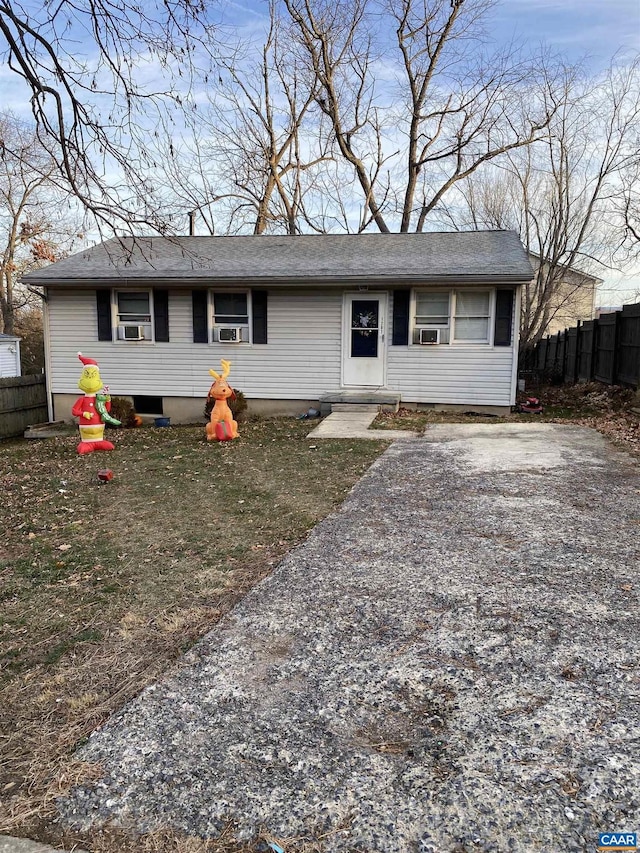 single story home featuring cooling unit