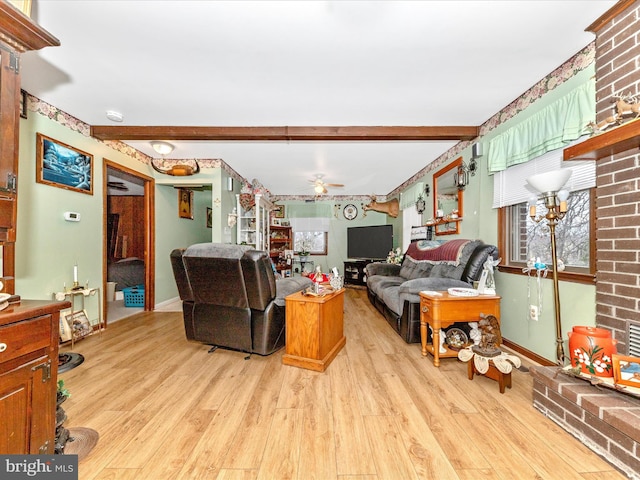 living room with beam ceiling, ceiling fan, and light hardwood / wood-style flooring