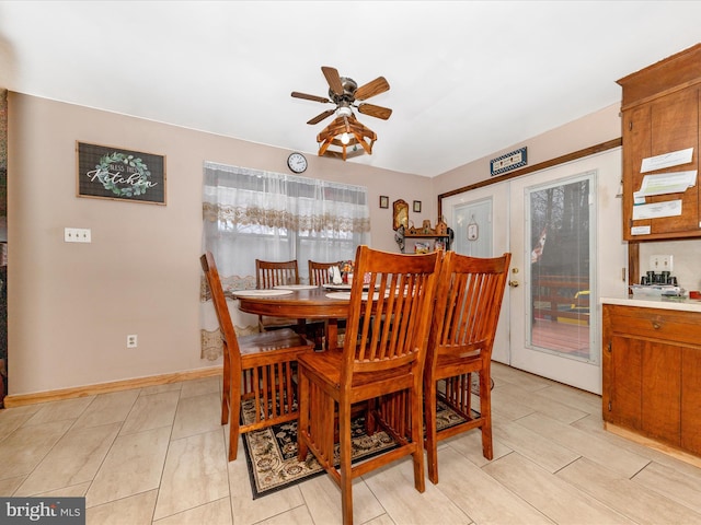 dining area with ceiling fan