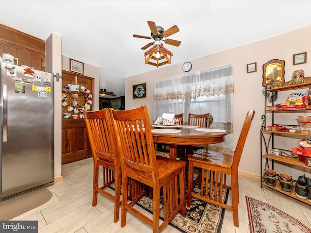 dining space featuring ceiling fan