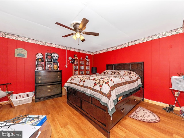 bedroom featuring ceiling fan and light hardwood / wood-style floors