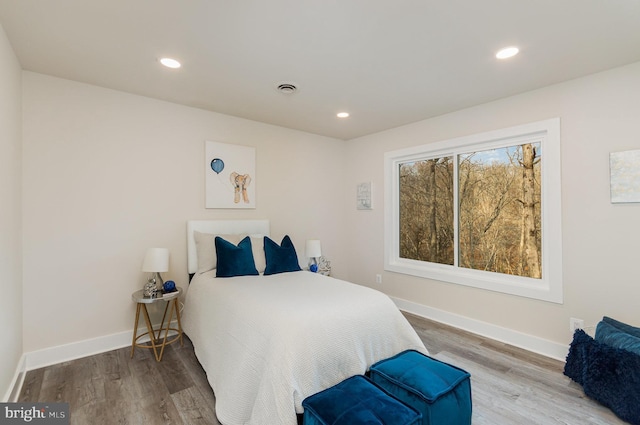 bedroom featuring hardwood / wood-style flooring