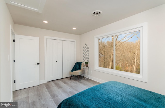 bedroom with light wood-type flooring