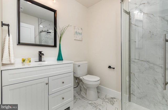 bathroom featuring vanity, toilet, and walk in shower